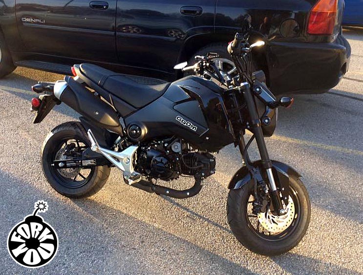 Customer's Black Grom with Matte Black Fork You Wraps installed. 