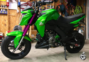 Kawasaki Z125 with Gloss Fierce Fuchsia Fork Wraps